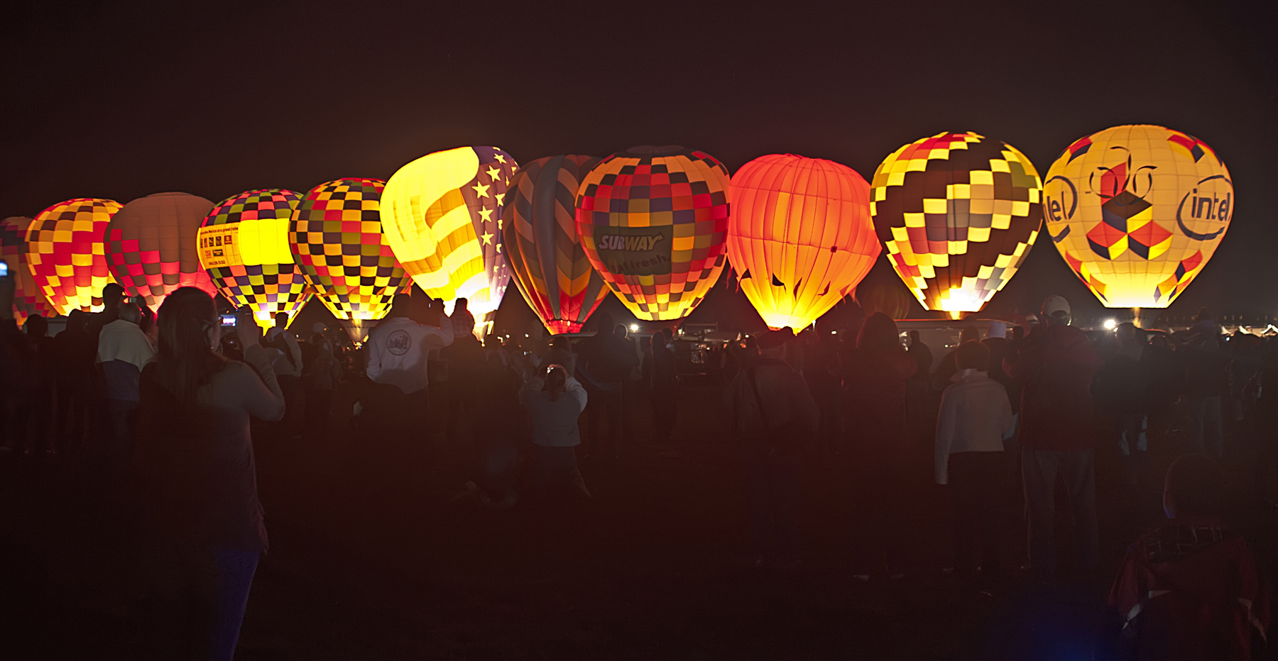 Hot air balloon festivals in Arizona begin in the early hours.