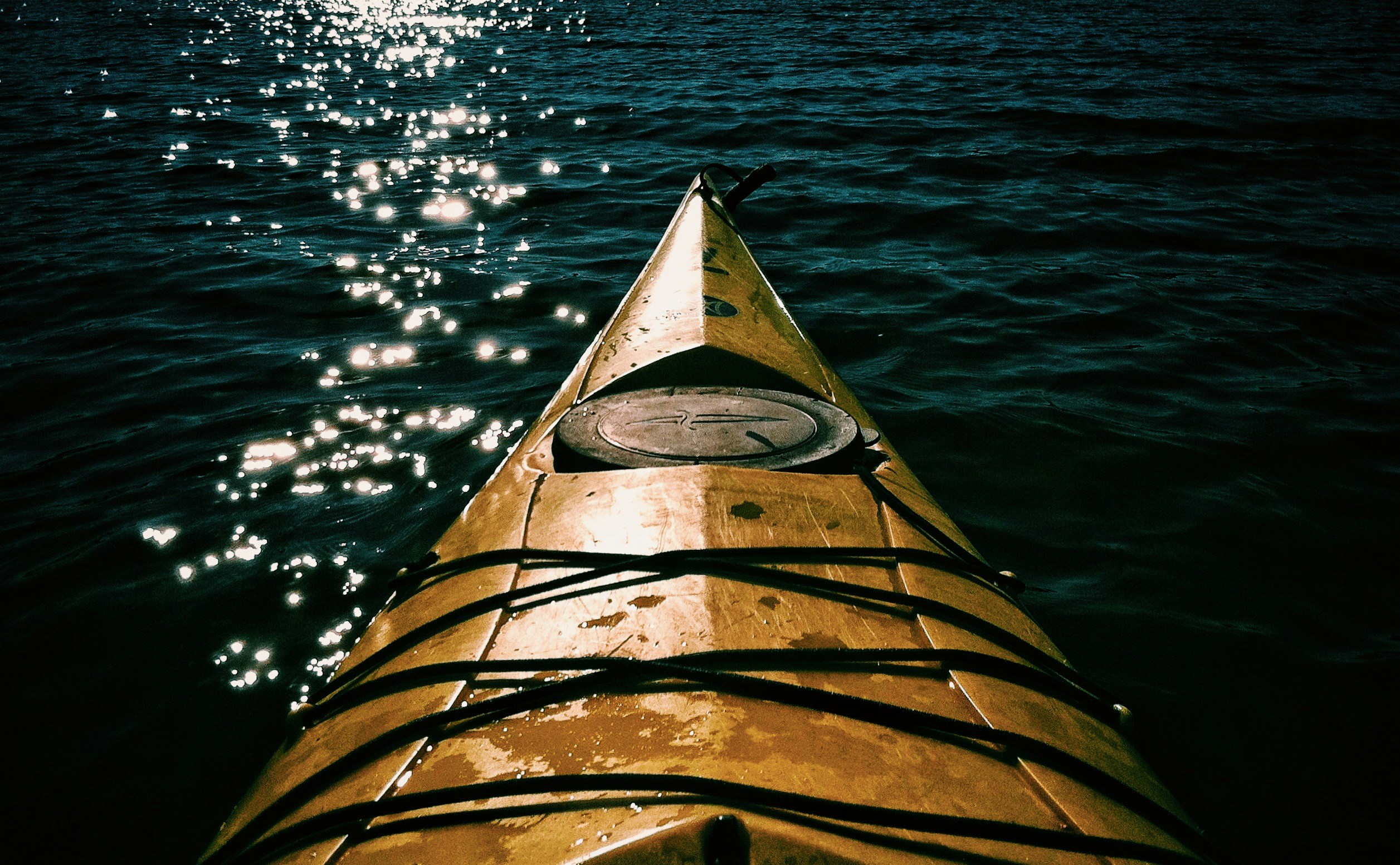 Bow of a Yellow Kayak in the lake