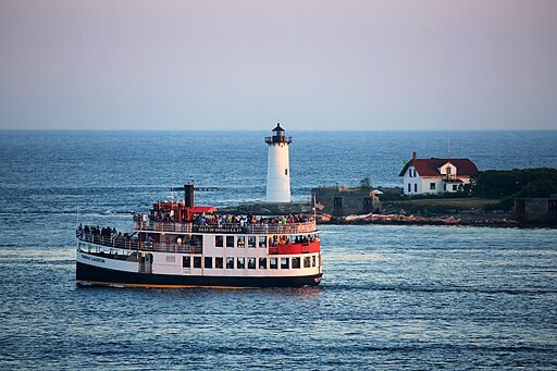 A cruise enjoys the view of the Portsmouth Harbor Light House