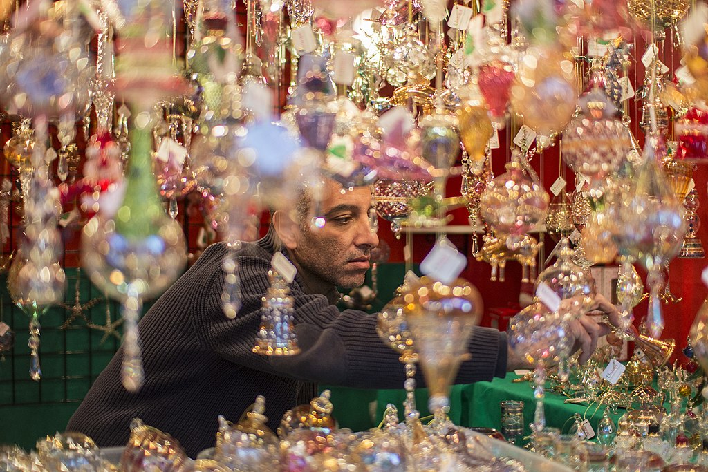 Man shops for glass ornaments for Christmas in Oaks, PA