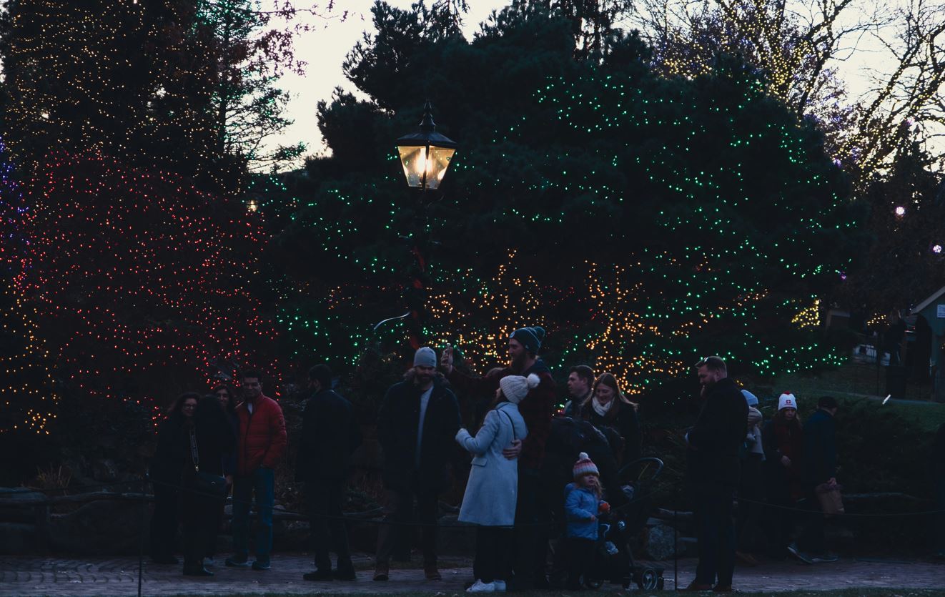 People enjoy the lights at Peddlers Village at Christmas Time