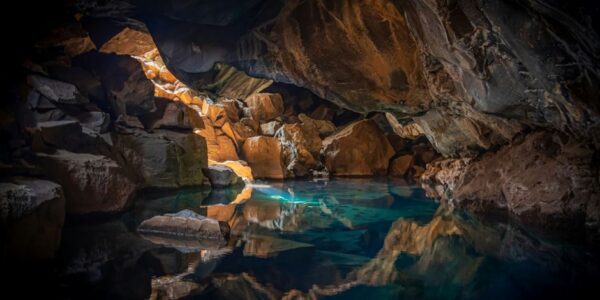 Blue pool of water in a cave