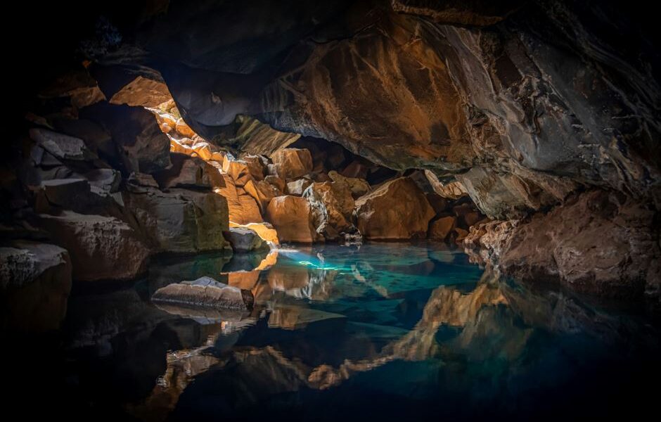 Blue pool of water in a cave