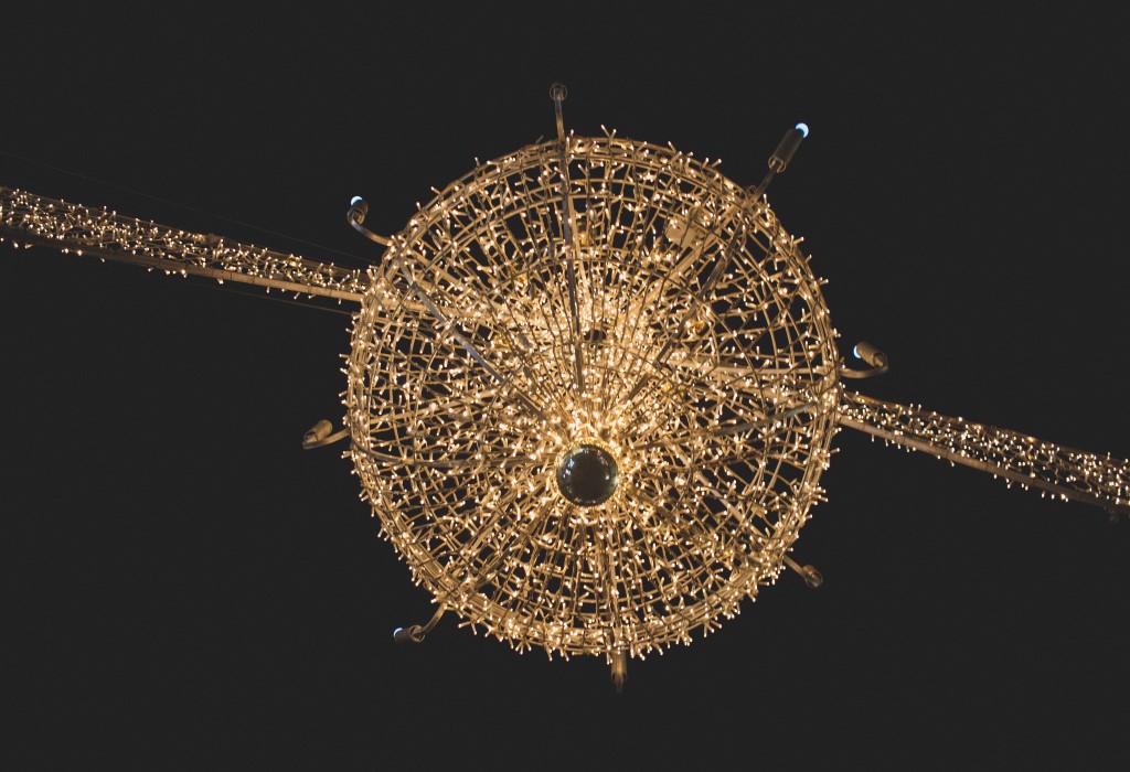 Thousands of Christmas lights create a spherical ornament