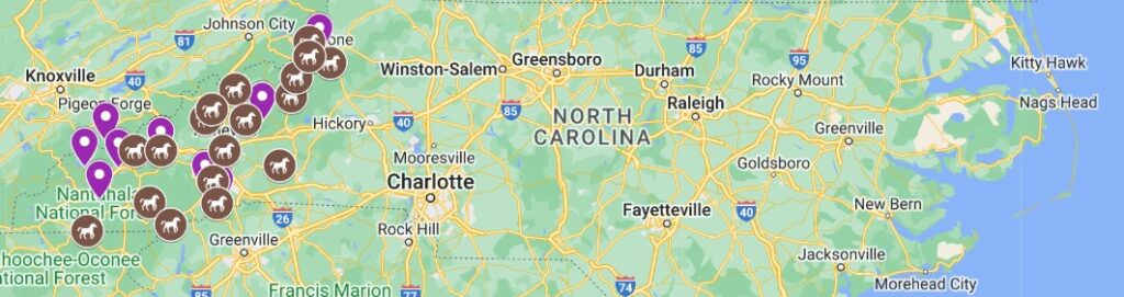 A map of North Carolina with the locations marked for several horse farms where visitors can sign up for horseback riding in the NC mountains.
