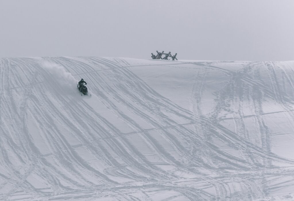One of the coolest places to go snowmobiling in Colorado is Vail Pass. Here you can experience elevation change and fresh powder.